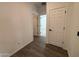 Hallway with tile floors and neutral walls at 47489 W Kenner Dr, Maricopa, AZ 85139