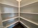 Bright white pantry with ample shelving at 47489 W Kenner Dr, Maricopa, AZ 85139