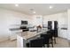 Modern kitchen with granite countertops and stainless steel appliances at 47558 W Mellen Ln, Maricopa, AZ 85139