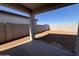 Spacious backyard with block wall and covered patio at 47762 W Moeller Rd, Maricopa, AZ 85139