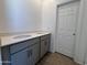 Double vanity bathroom with modern gray cabinets at 47762 W Moeller Rd, Maricopa, AZ 85139