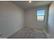 Bright bedroom featuring large windows and neutral walls at 47762 W Moeller Rd, Maricopa, AZ 85139