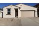 One story home with tan exterior and two-car garage at 47762 W Moeller Rd, Maricopa, AZ 85139