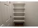 Well-lit pantry with five shelves at 47762 W Moeller Rd, Maricopa, AZ 85139