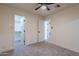 Bright bedroom with closet and access to another room at 501 W Yukon Dr # 8, Phoenix, AZ 85027