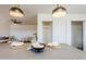 Kitchen island with gray countertop and modern pendant lighting at 501 W Yukon Dr # 8, Phoenix, AZ 85027