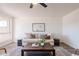 Living room with sofa and coffee table in front of window at 501 W Yukon Dr # 8, Phoenix, AZ 85027