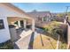 Elevated view of backyard, showing patio, storage shed, and grassy areas at 5226 S 15Th St, Phoenix, AZ 85040