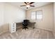 Well-lit bedroom with desk and built-in shelving at 5226 S 15Th St, Phoenix, AZ 85040