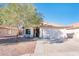 One-story home with a two-car garage and landscaped front yard at 5226 S 15Th St, Phoenix, AZ 85040