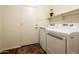 Laundry room with washer, dryer, and exterior access at 5226 S 15Th St, Phoenix, AZ 85040