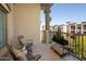 Private balcony with seating area and city views at 5350 E Deer Valley Dr # 4434, Phoenix, AZ 85054