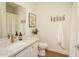 Clean bathroom with single vanity and shower/tub combo at 5350 E Deer Valley Dr # 4434, Phoenix, AZ 85054