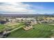 Aerial view of a beautiful golf course with a lake and green landscape at 5350 E Deer Valley Dr # 4434, Phoenix, AZ 85054