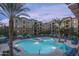 Expansive pool with plenty of lounge chairs and umbrellas at 5350 E Deer Valley Dr # 4434, Phoenix, AZ 85054