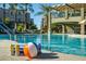 Relaxing poolside view with beach balls and refreshing drinks at 5350 E Deer Valley Dr # 4434, Phoenix, AZ 85054