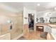 Elegant bathroom features a walk-in shower, double vanity, and large closet at 5720 W Robb Ln, Glendale, AZ 85310