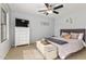 Spacious bedroom with a king-size bed and a dresser at 5720 W Robb Ln, Glendale, AZ 85310