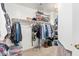 Spacious walk-in closet with ample shelving and hanging space at 5720 W Robb Ln, Glendale, AZ 85310