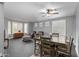 Living room with bay window, hardwood floors, and comfortable seating at 5720 W Robb Ln, Glendale, AZ 85310