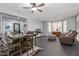 Living area with hardwood floors, recessed lighting and comfortable seating at 5720 W Robb Ln, Glendale, AZ 85310