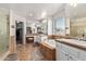 Elegant bathroom with double sinks, a large soaking tub, and a walk-in shower at 5720 W Robb Ln, Glendale, AZ 85310