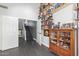 Home office with built-in shelving and view of staircase at 5720 W Robb Ln, Glendale, AZ 85310