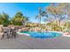 Relaxing kidney-shaped pool with waterfall feature and patio at 5720 W Robb Ln, Glendale, AZ 85310