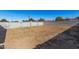 Large backyard with block wall and desert landscaping at 603 S 7Th St, Avondale, AZ 85323