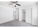 Bedroom with ceiling fan and sliding closet doors at 603 S 7Th St, Avondale, AZ 85323