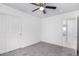 Simple bedroom with grey carpet and double doors at 603 S 7Th St, Avondale, AZ 85323