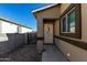 New construction home with side entrance and neutral color scheme at 603 S 7Th St, Avondale, AZ 85323