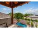 Balcony overlooking the pool and surrounding landscape at 6168 S Fairway Pl, Gold Canyon, AZ 85118