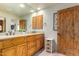 Elegant bathroom with double vanity and granite countertop at 6168 S Fairway Pl, Gold Canyon, AZ 85118