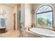 Spa-like bathroom with soaking tub and walk-in shower at 6168 S Fairway Pl, Gold Canyon, AZ 85118