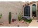 Private courtyard with seating area, artificial turf, and cacti at 6168 S Fairway Pl, Gold Canyon, AZ 85118