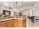 Kitchen island with granite countertop and pendant lighting at 6168 S Fairway Pl, Gold Canyon, AZ 85118