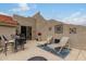 Private rooftop patio with lounge chairs and small table at 6168 S Fairway Pl, Gold Canyon, AZ 85118