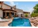 Private pool area with lounge chairs and a floating lounger at 6168 S Fairway Pl, Gold Canyon, AZ 85118