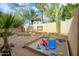 Sandy play area and raised garden beds at 6458 E Raftriver St, Mesa, AZ 85215