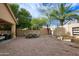 Outdoor dining area in a gravel backyard at 6458 E Raftriver St, Mesa, AZ 85215