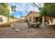 Backyard with patio, play area, and garden at 6458 E Raftriver St, Mesa, AZ 85215