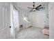 Bedroom with ceiling fan and window at 6458 E Raftriver St, Mesa, AZ 85215