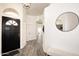 Bright entryway with gray flooring and white walls at 6458 E Raftriver St, Mesa, AZ 85215