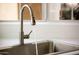 Stainless steel kitchen sink and faucet at 6458 E Raftriver St, Mesa, AZ 85215