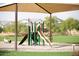 Community playground with shaded area at 6458 E Raftriver St, Mesa, AZ 85215