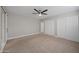 Bright bedroom featuring neutral walls and ample closet space at 6630 E Dreyfus Ave, Scottsdale, AZ 85254