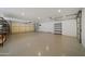 Clean and well-organized garage with built-in storage shelving at 6630 E Dreyfus Ave, Scottsdale, AZ 85254