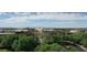 Aerial view of a business park with lush landscaping and mountain views at 6811 W Monona Dr, Glendale, AZ 85308