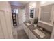 Modern bathroom with double vanity and updated fixtures at 6811 W Monona Dr, Glendale, AZ 85308